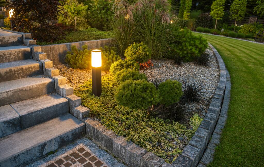 Outdoor seating area surrounded by lush greenery